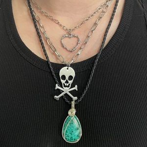Malachite and chrysocholla wire wrapped crystal pendant